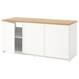 A KNOXHULT white modular kitchen cabinet with light wood countertop.
