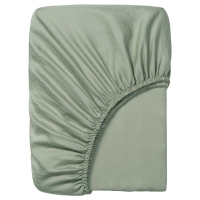 Green LÄKEVÄNDEROT fitted sheet, smooth lyocell fabric with elastic edges.