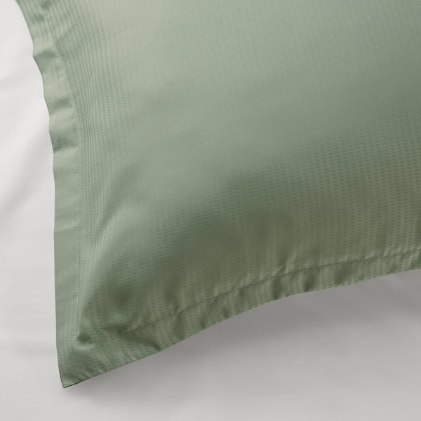 Fresh green pillowcase, smooth texture, elegant flange.