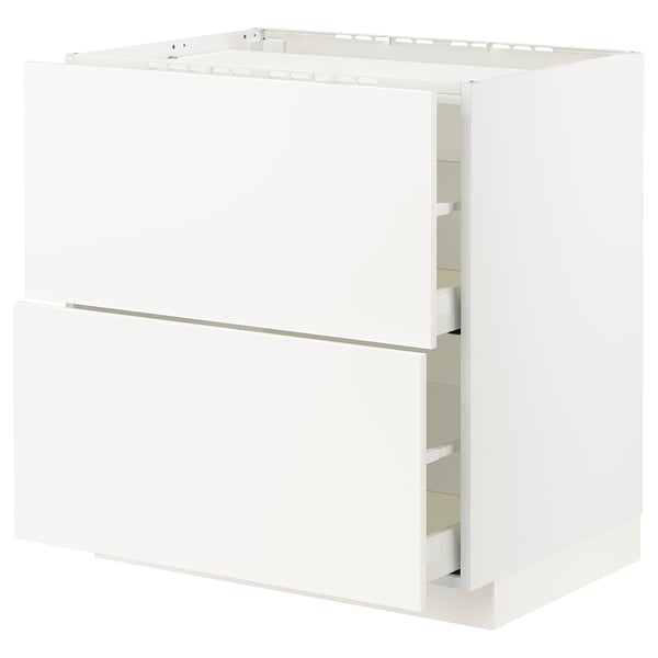 A white METOD kitchen cabinet with smooth veddinge fronts, featuring a robust frame and a high drawer.
