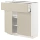 White and beige kitchen cabinet from IKEAs METOD series with adjustable shelves and smooth drawer fronts.