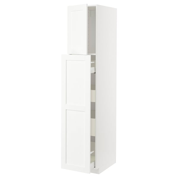 A white METOD kitchen cabinet with one open door, displaying its shelves.