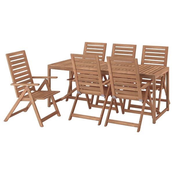 A NÄMMARÖ outdoor dining set with a rectangular table and six folding chairs, all made of light brown acacia wood with a natural finish.