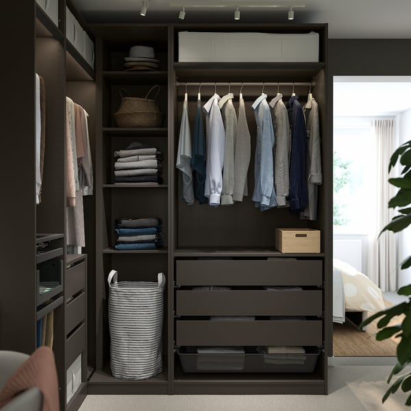 PAX wardrobe with shelves, hanging space, drawers, clothes, and organisers.
