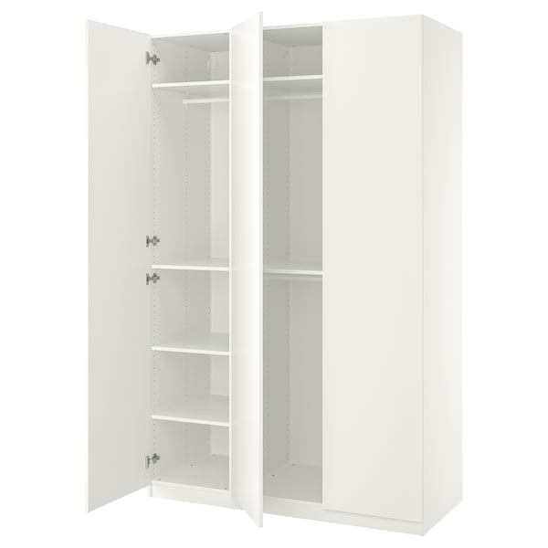 An open white ikea PAX wardrobe, a minimalist storage solution with adjustable shelves, and hanging sections.