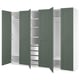 An open teal-colored PAX wardrobe with multiple shelves and compartments.