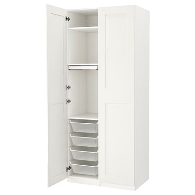 White PAX wardrobe, open showing shelves, baskets, and trouser hanger.