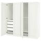 White ikea PAX wardrobe with open doors, shelves, and drawers.