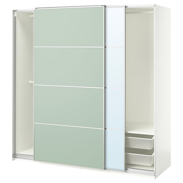 An IKEA PAX wardrobe in white with frosted glass doors. The wardrobe has a minimalist design and includes a mesh storage basket.