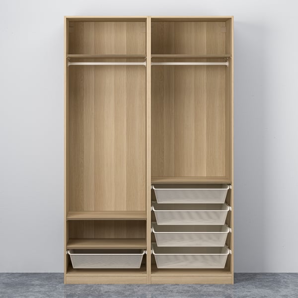 Wooden wardrobe with sliding doors, shelves, and mesh drawers for storage. Adjustable feet and soft-closing doors.