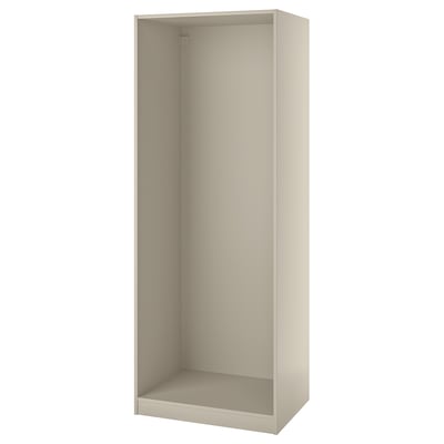 A beige ikea PAX wardrobe frame, rectangular in shape, with adjustable feet and pre-drilled holes for easy assembly.