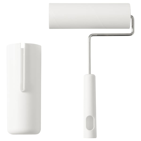 A white PEPPRIG lint roller set with an extendable handle and a storage case. The roller is wide, designed for quick cleaning of large surfaces.