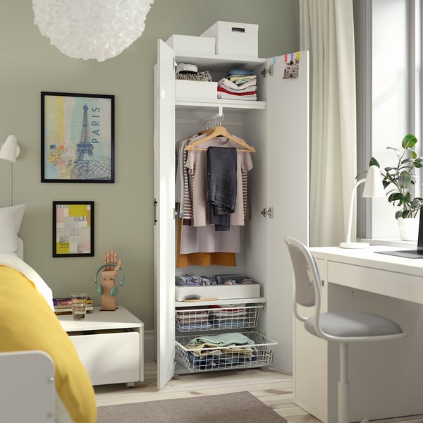 Open wardrobe showing clothes and storage with shelves and drawers. Soft-closing doors and adjustable feet for stability.
