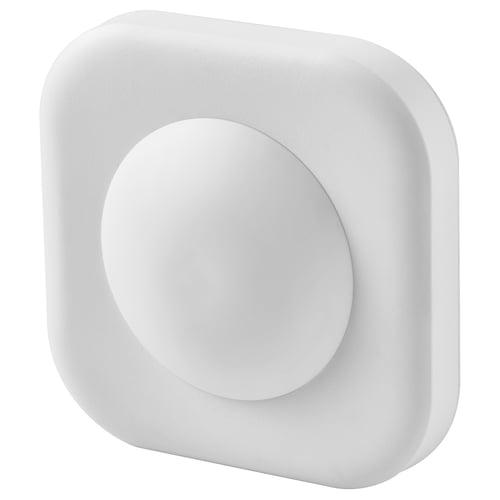 A white, square motion sensor. It has a smooth finish and is designed to be discreet and easy to place.