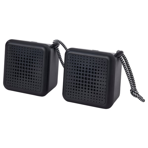 Two black square VAPPEBY portable speakers, waterproof, connected by a cord.