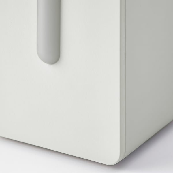 A sleek, minimalist air quality sensor, predominantly white with a grey handle, indicating precise and modern design.