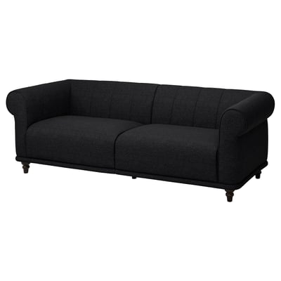 Black VISKAFORS sofa. Classic, inviting design with soft, rounded shapes and deep seats. Upholstered in fabric, supported by wooden legs.