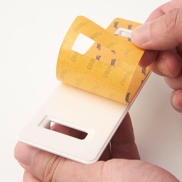Organizator stenskih kavljev za roke