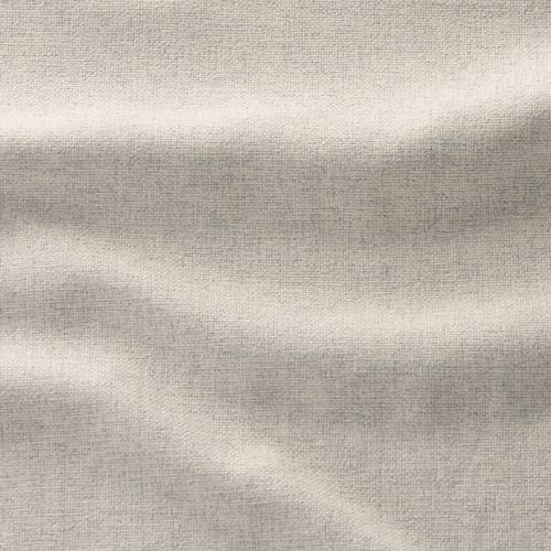 Mehka, teksturirana tkanina od blizu, ki prikazuje tkanje in tople odtenke.