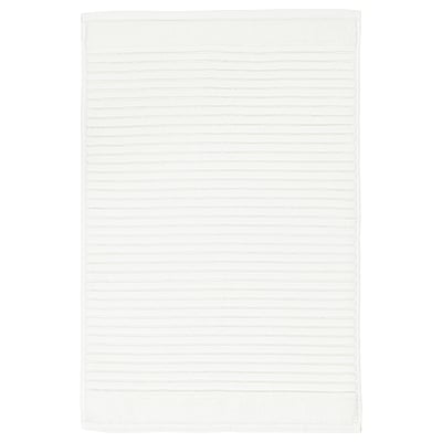 A white, rectangular ALSTERN cotton terry bath mat. Its design a textured surface for foot massage and quick drying.
