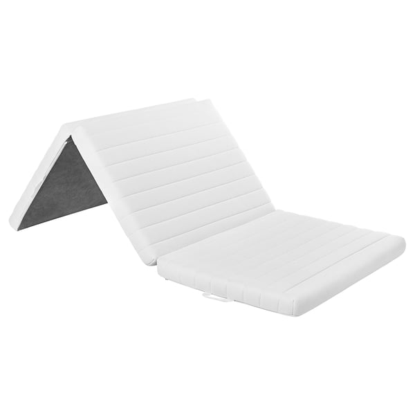 A white, foldable mattress pad by ÅNNFJÄLLET with a tri-fold design, made from eco-friendly materials.