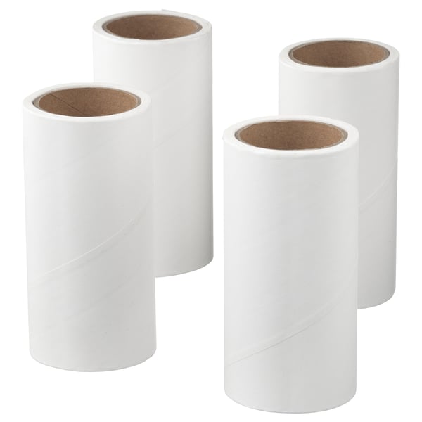 Four white cylindrical BÄSTIS lint roll refills, each with brown cardboard cores, laid flat against a white background.