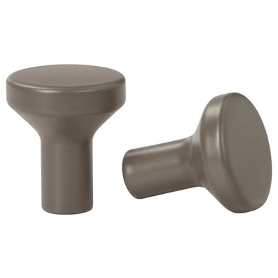 Two modern, silver, cylindrical cabinet knobs with flat tops, shown from different angles.