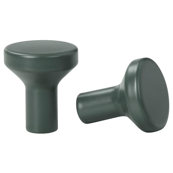 Two grey BAGGANÄS knobs, smooth and rounded, with a modern design, made of coated steel.