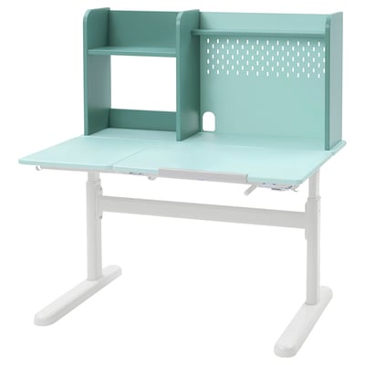 The BERGLÄRKA desk in green. It has adjustable height, shelves, and a perforated panel. The legs are white and metallic.