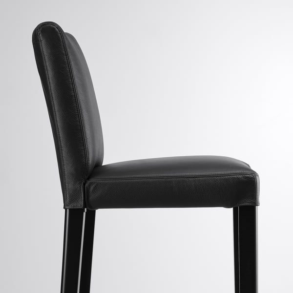 Black leather bar stool with metal legs, offering cushioned comfort and stylish design.