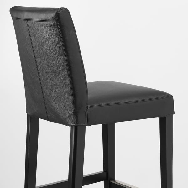 Modern barstool with sleek black leather seat and backrest, offering cushioned comfort and stylish support.