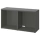 Dark grey rectangular shelf unit, part of IKEAs BESTÅ series, with open compartments and sleek design.