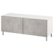 Modern white tv stand with grey doors, concrete effect, metal legs for sleek, organised space.