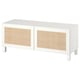 White BESTÅ tv bench, wicker doors, square legs, modern minimalist design.