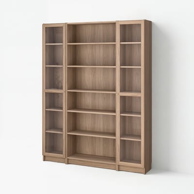 An empty, light brown wooden BILLY bookcase with multiple open shelves and glass doors, offering versatile storage.
