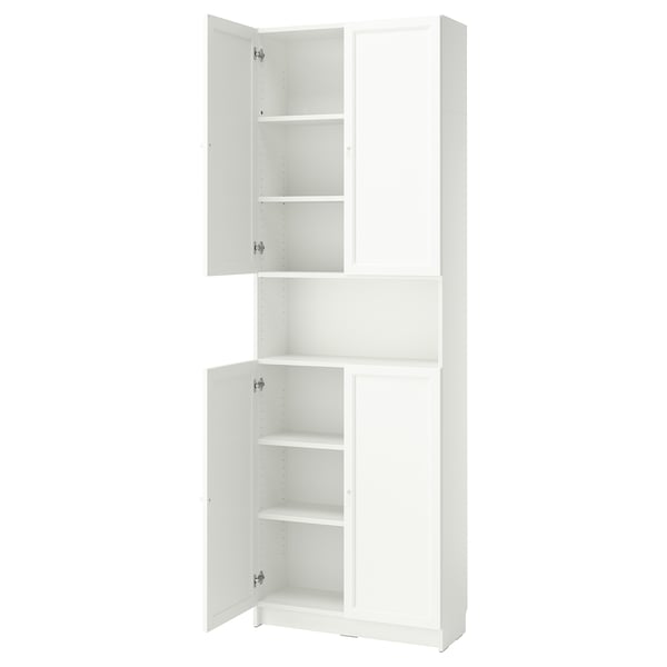 A white BILLY bookcase with both open and closed storage. It multiple shelves for customizable organisation.