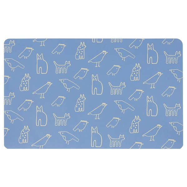 Blue rectangular desk pad with white bird and cat outlines, recycled polyester top, non-slip rubber base.