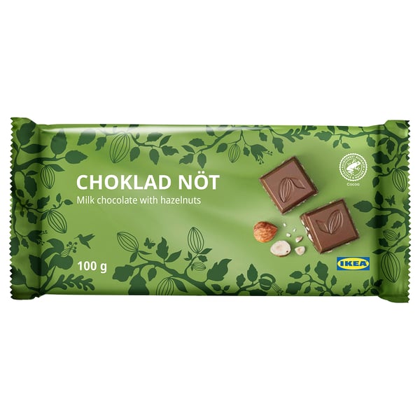 Green chocolate bar wrapper with hazelnuts, labelled CHOKLAD NÖT, weighing 100g.