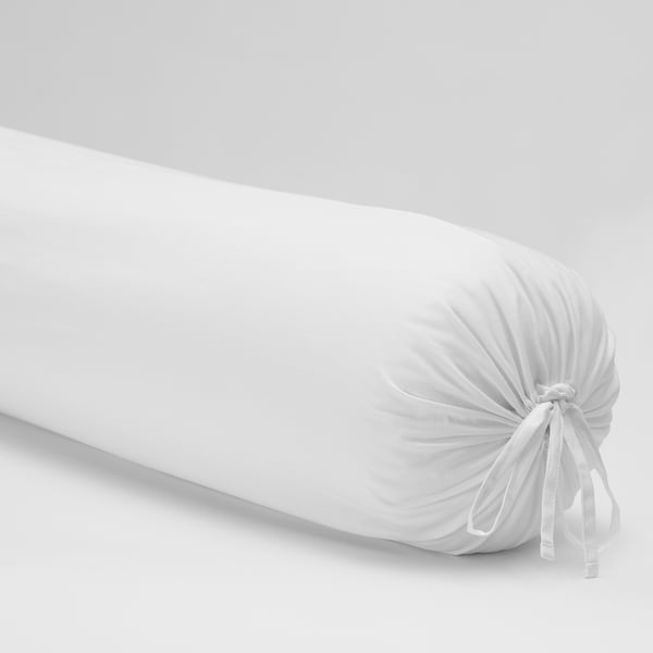 White rolled bolster, neatly tied with a ribbon, showcasing soft, high-quality cotton.