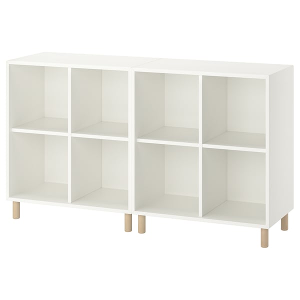 A white EKET shelf unit with wooden legs, featuring six empty compartments in a grid design.