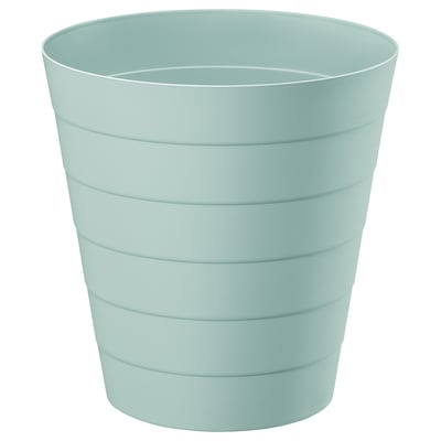 A FNISS waste bin in turquoise. Its made of durable recycled polypropylene. The bins cylindrical shape clean horizontal lines.