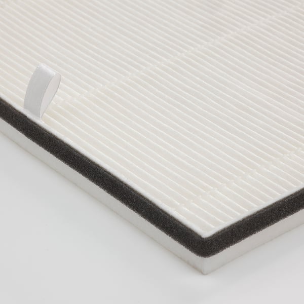Close-up of rectangular philtre with textured centre, black edge, and white tab. Highlights quality design and materials.