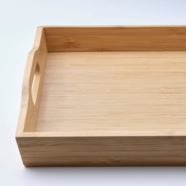 Light wooden tray with handles, made of bamboo, smooth finish, rectangular shape.