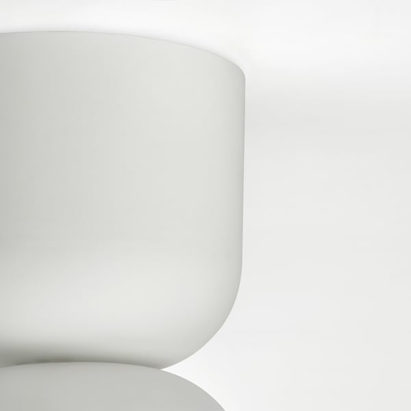 Modern, minimalist ceiling light in pristine white. Sleek, smooth design. Elegant, minimalist aesthetic.