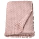 Light pink HORNMAL throw, soft & fluffy, woven texture, fringe edges.