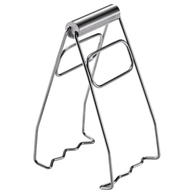 Silver stainless steel kitchen tool; a-frame design, rounded handle, wavy lower ends.