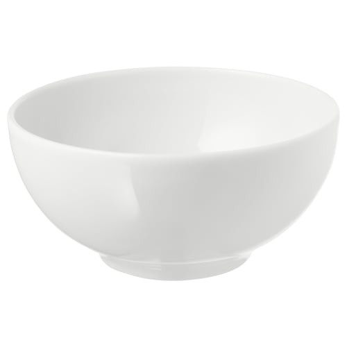 Single white porcelain bowl, simple design, wide and deep shape for versatile use.