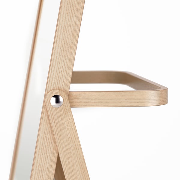 Well-constructed wooden shelf detail, artfully designed with sleek lines and a metallic fastener, exuding quality craftsmanship.