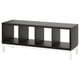 Black KALLAX shelving unit with four compartments and white legs.