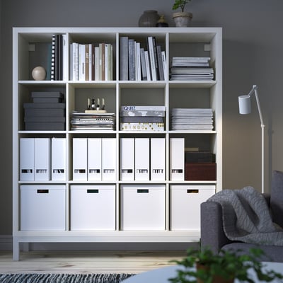 KALLAX white shelving unit, large, holds books, boxes, and decor, fits room corner, modern design.